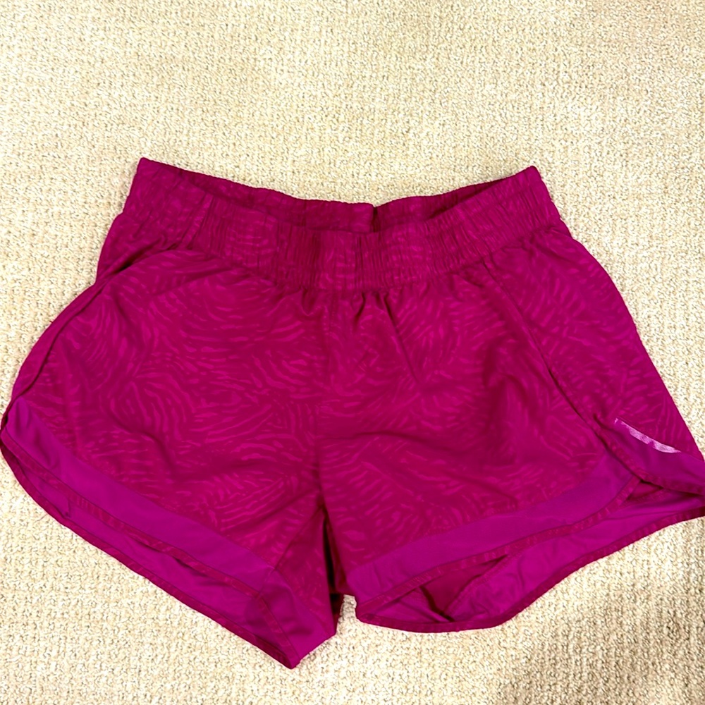 Athleta mesh racer run short 4 size M. Zipper stash pocket.
